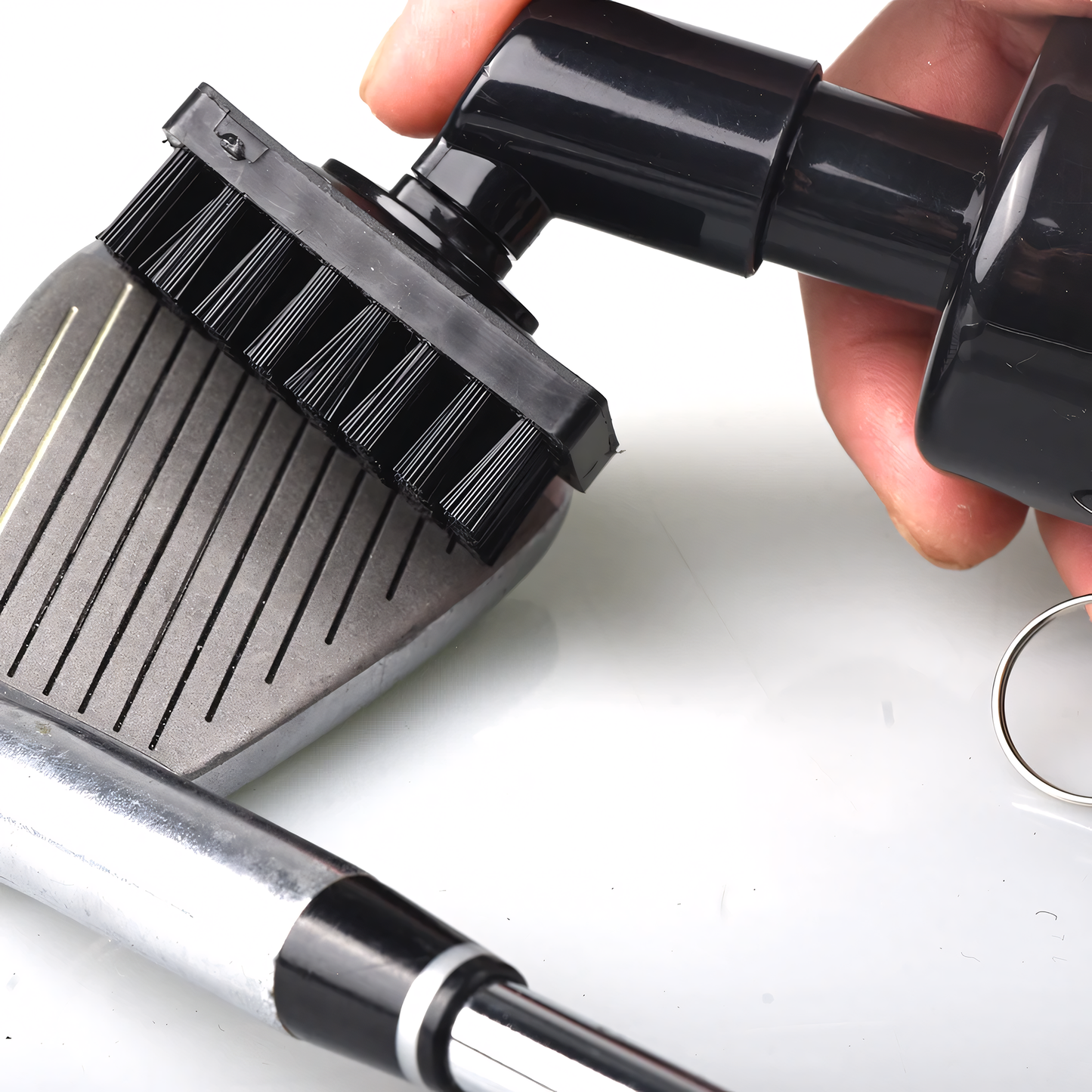 Close-up view of durable nylon bristles on top-rated golf club brush for deep cleaning.